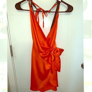 orange satin halterneck wrap bodycon dress